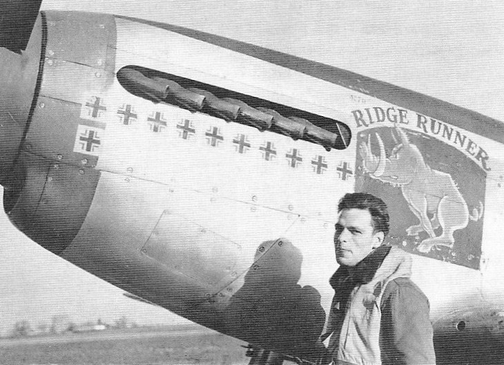 Young white man and "Ridge Runner" airplane