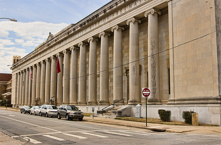 Multistory building with row of columns on street