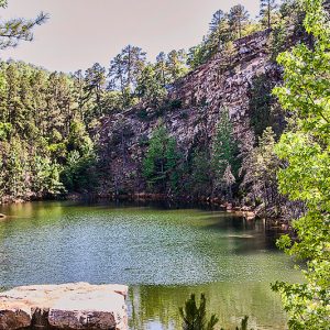 Small quarry pond on mountain trail
