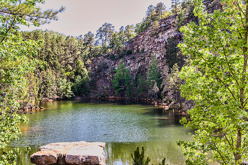 Small quarry pond on mountain trail