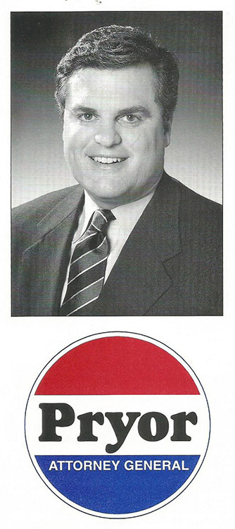Large white man smiling in suit and tie on campaign literature