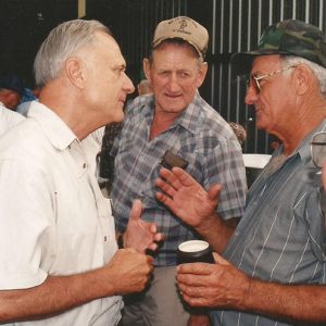 Group of older white men talking