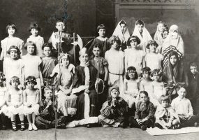 Group of white Jewish children in stage costumes
