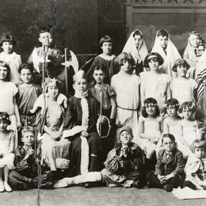 Group of white Jewish children in stage costumes
