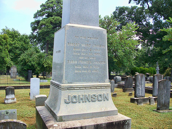 "Johnson" monument and gravestones in cemetery
