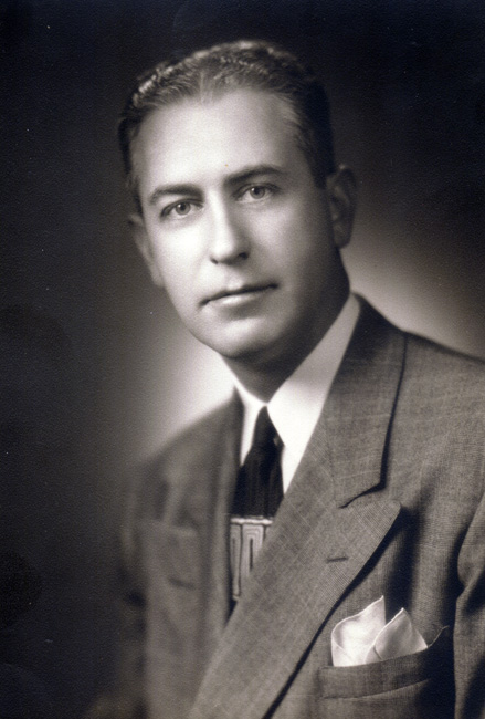 White man in suit and tie