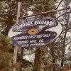"Home of Rimrock Records" hanging vinyl record shaped sign