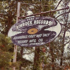 "Home of Rimrock Records" hanging vinyl record shaped sign