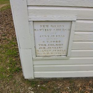 "New Ronok Baptist Church built July 11, 1943" plaque on building with officer names