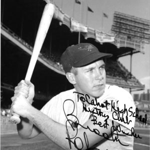Picture of white man in uniform with swinging a bat signed "To Cabot High School History Club Best Wishes Brooks Robinson"