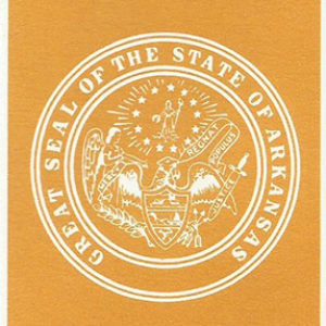 Seal in white on gold background with text on program cover