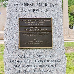 Stone monument with engraving and plaque at "Rohwer Japanese-American Relocation Center"