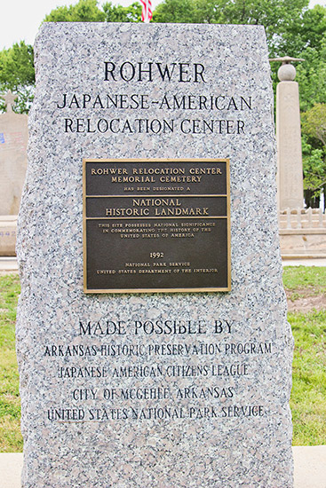 Stone monument with engraving and plaque at "Rohwer Japanese-American Relocation Center"