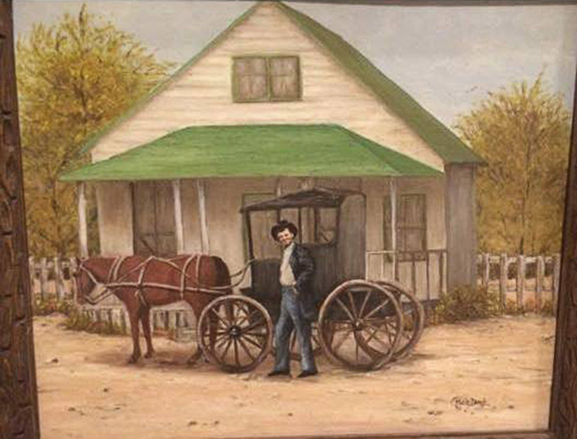 White man standing with horse drawn carriage in front of house with covered porch