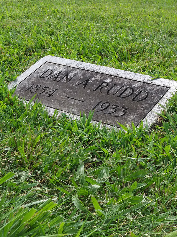 "Dan A. Rudd" gravestone on grass