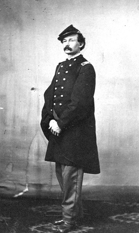 White man standing in military garb
