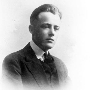 Young white man in a three piece suit