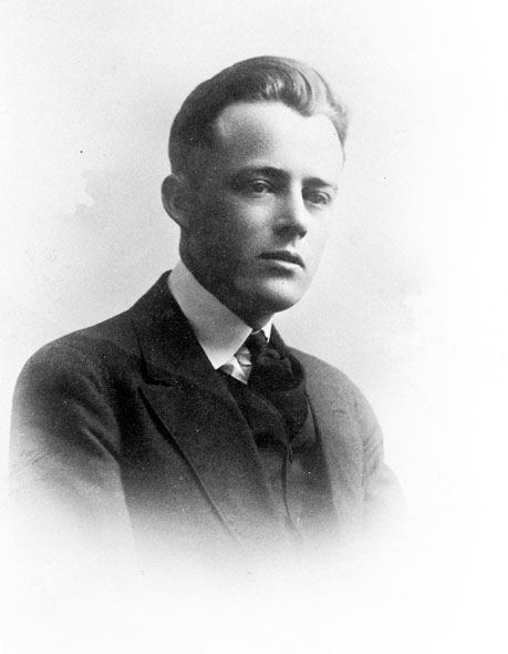 Young white man in a three piece suit