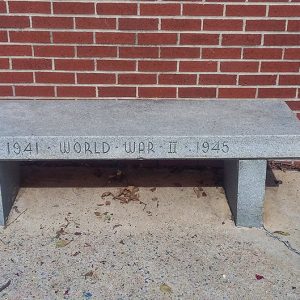 World War II engraved bench in courtyard