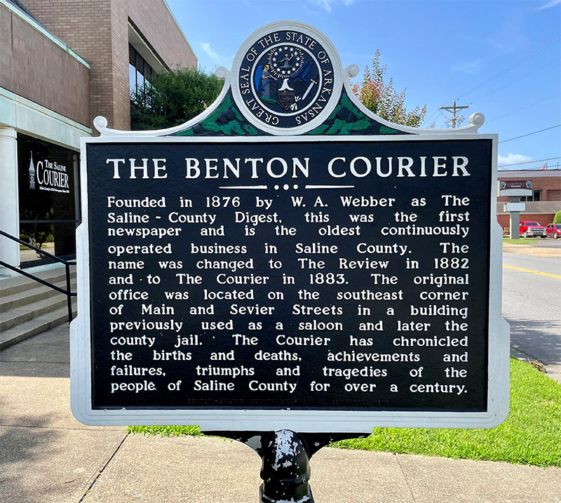 Sign with information regarding the Benton Courier