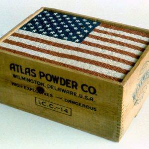 Box of red, white, and blue tipped matches making the image of the American flag