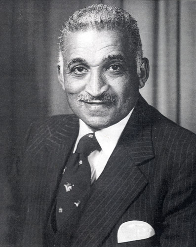 African American man in pinstriped suit and tie