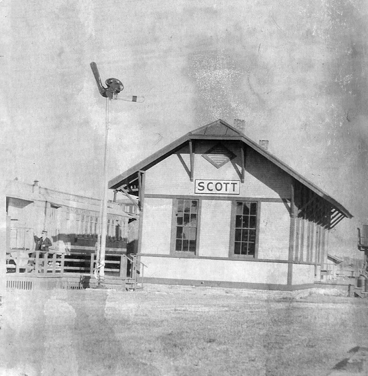 "Scott" train depot building and train on tracks