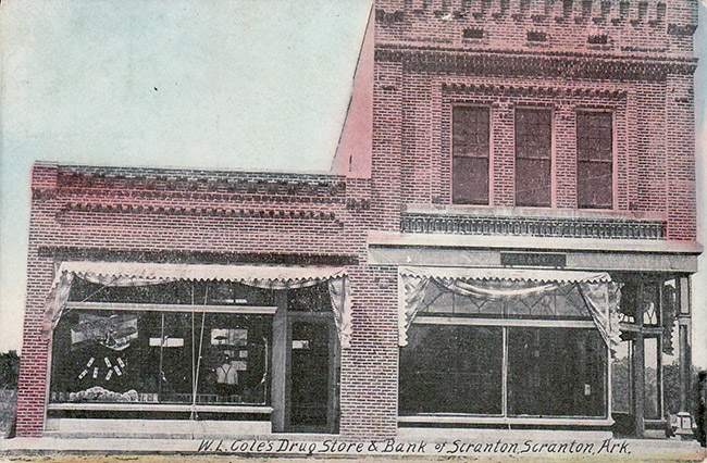 Brick storefront and two-story bank on street corner