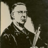 painting of white man with glasses holding paint brushes and palette board