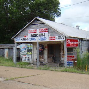 Single-story "Shadden's" barbeque building with beer signs