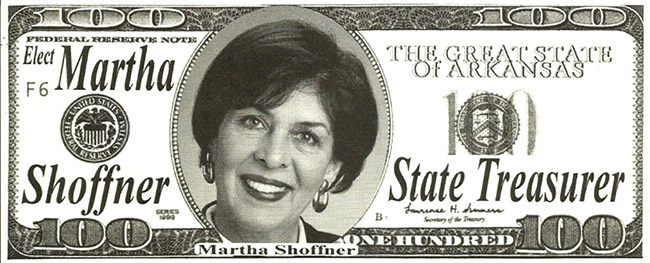Fake 100 dollar bill with portrait of white woman smiling and "Martha Shoffner State Treasurer" written on it
