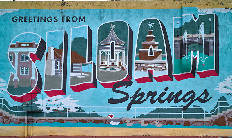 "Greetings from Siloam Springs" sign