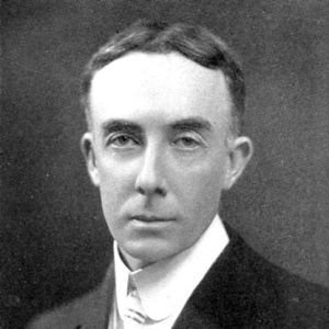 White man with short hair in suit and tie