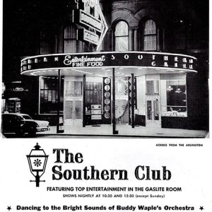 Multistory building with neon lights and "The Southern Club" logo on advertisement