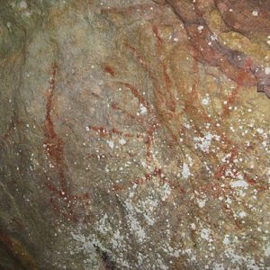 Reddish painting on cave wall