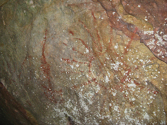 Reddish painting on cave wall