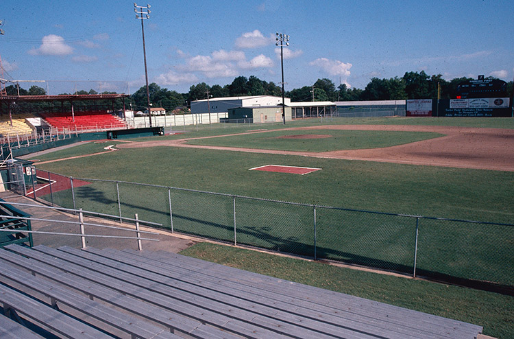 Baseball diamond and outbuildings as seen from bleachers