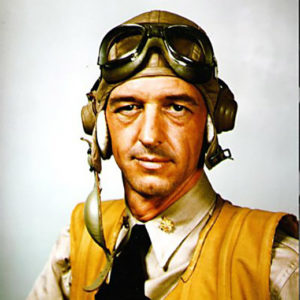 White man in aviator uniform with hat and goggles