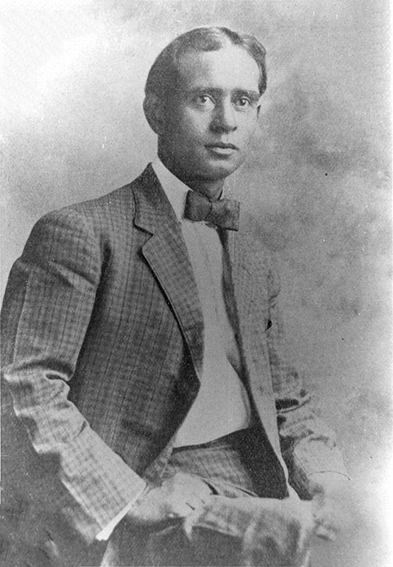 Young African-American man in suit and bow tie