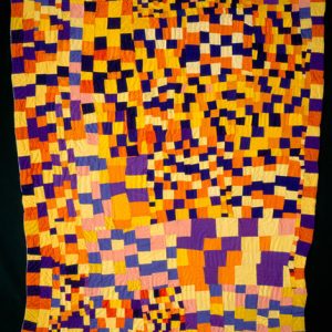 Multicolored quilt on black background