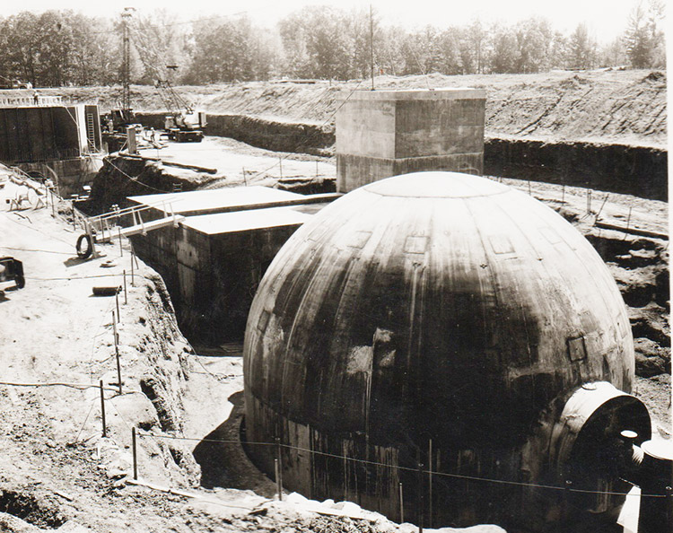 Concrete structures and round concrete dome in open pit