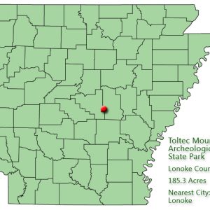 Arkansas map with red dot in Lonoke County and explanation in green text