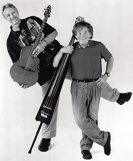 Two white men with guitar and electric upright bass