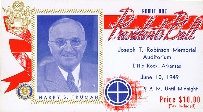 White man in glasses and suit on white background with red and blue text saying "Admit one Presidents' Ball Joseph T. Robinson Memorial Auditorium Little Rock, Arkansas, Price ten dollars"