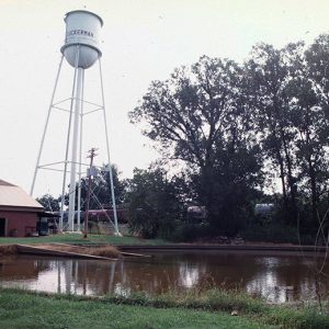 Water treatment facility with tower and outbuildings