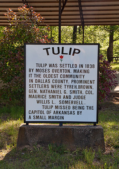 "Tulip" sign on stone pedestal