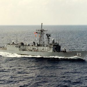 Naval ship at sea with number 20 on its bow