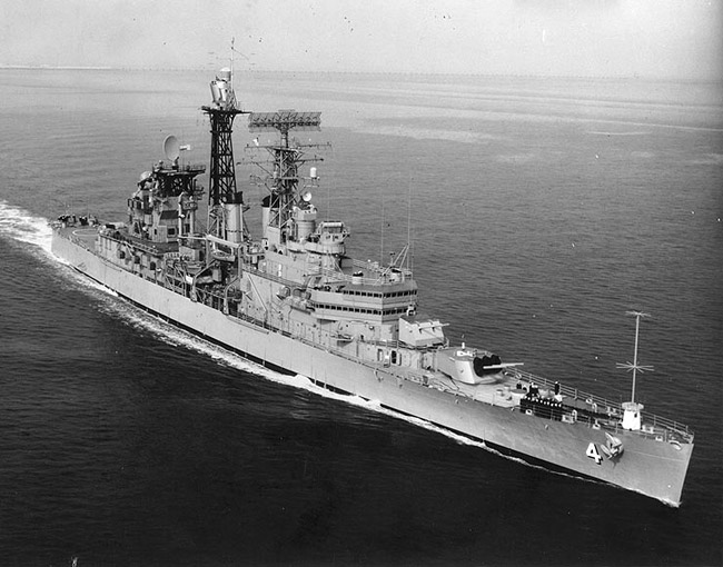 Navy warship at sea with number four on the bow