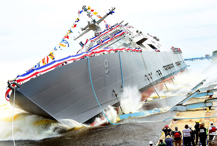 Naval ship being launched from dry dock