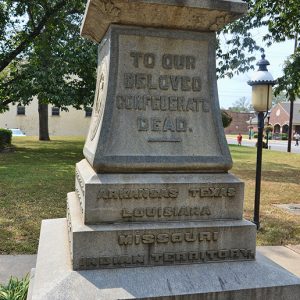 "To Our Beloved Confederate Dead" engraving on stone pedestal with state names on its base